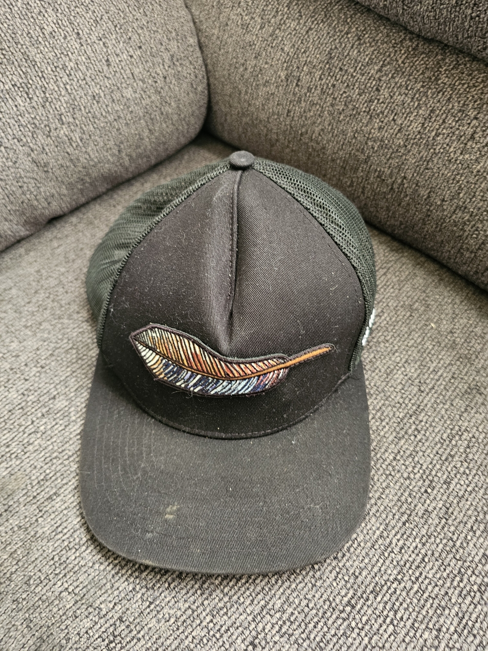 Men's Black Trucker Cap with Multicolor Feather Patch